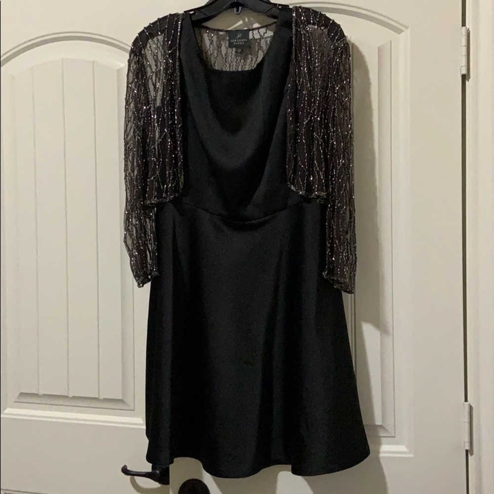 Black sleeveless dress with beaded jacket